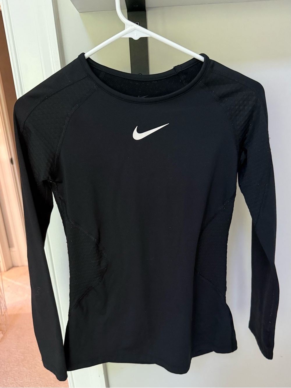 Nike Black Long-Sleeve Athletic Top with White Swoosh